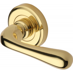 Charlbury Designer Lever Handles on Rose in Polished Brass