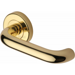 Harmony Lever Handles on Rose in Polished Brass