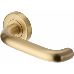 Harmony Lever Handles on Rose in Satin Brass