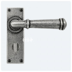Finesse Design Pewter Durham Lever Handles on Bathroom Backplate