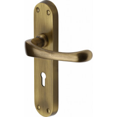 Gloucester Lever Handles on Backplate in Antique Brass