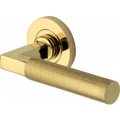 Signac Knurled Lever Handles on Rose in Polished Brass