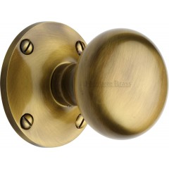 Kensington Large Victorian Knobs in Antique Brass