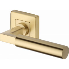 Bauhaus Lever Handles on Square Rose in Satin Brass