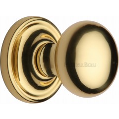 Hampstead Bun Door Knobs in Polished Brass