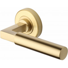 Bauhaus Lever Handles on Rose in Satin Brass