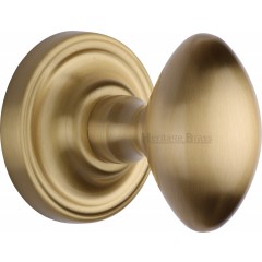 Chelsea Oval Door Knobs in Satin Brass