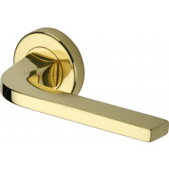 Bellagio Lever Handles on Rose in Polished Brass