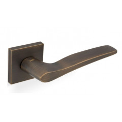 Valli Otello Lever Handles on Square Rose in Antique Brass