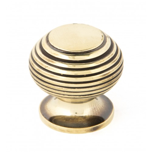 From the Anvil Reeded Cupboard Knob in Antique Brass from Cheshire