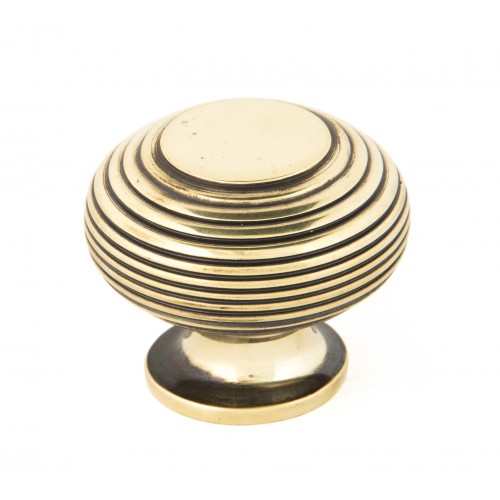 From the Anvil Reeded Cupboard Knob in Antique Brass from Cheshire