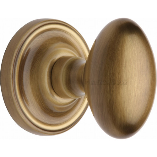 Modern Oval Mortice Door Knobs on Rose in Antique Brass from Cheshire