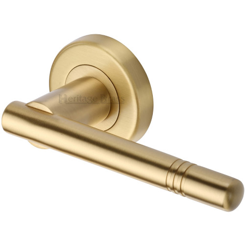 Alicia Reeded Bar Lever Handles on Rose in Satin Brass from Cheshire