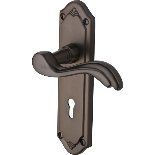 Marcus Lisboa Lever Handles On Backplate In Matt Bronze From