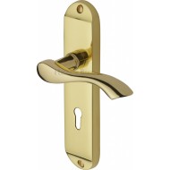 Algarve Lever Handles on Short Backplate in Polished Brass