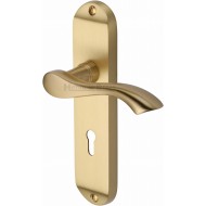 Algarve Lever Handles on Short Backplate in Satin Brass