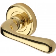 Charlbury Designer Lever Handles on Rose in Polished Brass