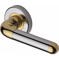 Vienna Modern Lever Handles on Rose in Polished Chrome and Brass