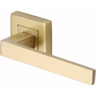Delta Lever Handles on Square Rose in Satin Brass