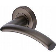 Centaur Curved Lever Handles on Rose in Matt Bronze