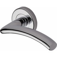 Centaur Curved Lever Handles on Rose in Polished Chrome