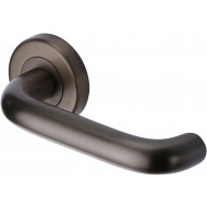 Harmony Lever Handles on Rose in Matt bronze