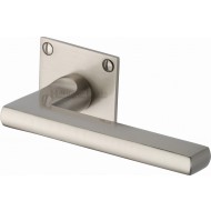 Trident Lever Handles on Slim Square Rose in Satin Nickel