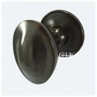 domed oval door knobs in Imperial Brass Unlaquered finish