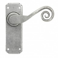 Monkeytail Door Lever Handles on Plain Backplate Pewter