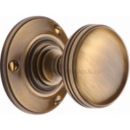 Richmond Period Door Knobs in Antique Brass