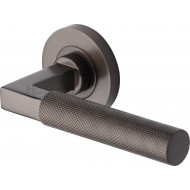 Signac Knurled Lever Handles on Rose in Matt Bronze