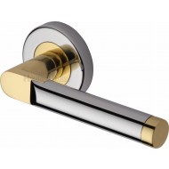 Celia Lever Handles on Rose in Chrome and Brass