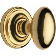 Chelsea Oval Door Knobs in Polished Brass
