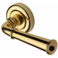Colonial Regency Lever Handles on Rose in Polished Brass