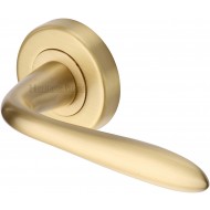 Sutton Lever Handles on Rose in Satin Brass