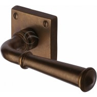 Square Bronze Period Lever Handles On Rose