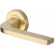 Bellagio Lever Handles on Rose in Satin Brass