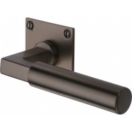 Bauhaus Lever Handles on Slim Square Rose in Matt Bronze