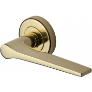 Gio Lever Handles on Rose in Polished Brass