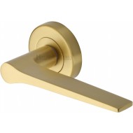 Gio Lever Handles on Rose in Satin Brass