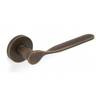 Valli H383 Lever Handles on Round Rose in Antique Brass