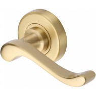 Bedford Lever Handles on Rose in Satin Brass