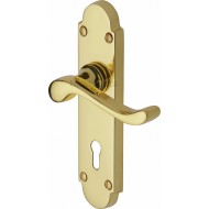 Savoy Lever Handles on Short Backplate in Polished Brass