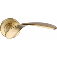 Volo Wing Lever Handles on Rose in Satin Brass